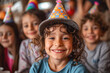 Group of Young Children Wearing Party Hats