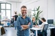 © ASDF - portrait of a smiling man standing in a modern office