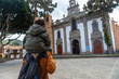 A mother with her son visiting the Basilica of Nuestra Senora del Pino in the municipality of Teror. Gran Canaria, Spain