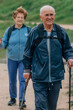 © carballo - senior couple hiking outdoors in nature