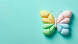 Rainbow Butterfly Easter on Pastel background. Happy Easter Concept.