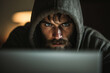 © ADDICTIVE STOCK - Intense hacker focusing on computer screen in darkness. Generative AI image