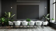 A mockup of an empty black on the wall with white table with chairs in conference room