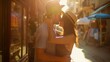 © MD Media - Young lovers couple in love hugging and kissing Romantic couple in love kissing in Venice, Italy - Tourists having fun on city street at holiday - People, love and holidays concept