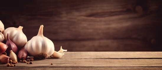 Aufkleber - Close up of garlic bulbs and cloves on wooden surface