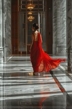 In A Luxurious Hotel Lobby, A South Asian Woman Gracefully Walks Across The Marble Floor, Her Elegance And Poise Captivating All Who Pass By