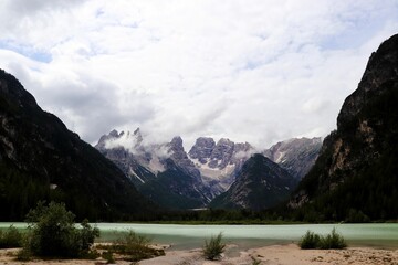 Wall Mural - Beautiful shot of a lake with a mountainous landscape in the background