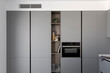 © ADDICTIVE STOCK - Sleek modern kitchen with grey cabinetry and appliances