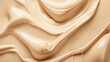 Close-up of a creamy cosmetic texture, smooth and glossy, with soft undertones