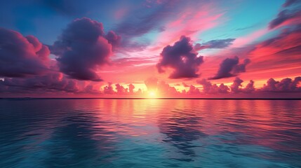 Wall Mural - Captivating moment of the sun setting over the ocean, surrounded by a spectacle of pink and blue clouds