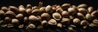 Coriander (seeds) on a black background.