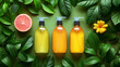 Three bottles of shampoo or detergent surrounded by green leaves and grapefruit. Cleanliness and cleaning concept.