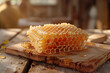 Close up on delicious organic honeycomb on a wooden cutting board