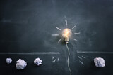 Fototapeta Mapy - Education concept image. Creative idea and innovation. light bulb metaphor over blackboard background