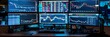 © korisbo - A stock market setup with multiple monitors displaying realtime business data and graphs, showcasing the digital environment of financial trading. With a softly blurred background that accentuates det