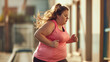 © Helga P-A. - Fat woman wearing a pink sports jersey jogging outside. The concept of weight loss and a healthy lifestyle