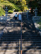 Two female tourists climbing the stairs leading to Sofukuji temple in Nagasaki, Japan