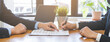 © KMPZZZ - Business finance concept, teamwork and partnership asian businessman customer and salesman discussing client, hand sign sales contract with document at desk office. Lawyers working together at meeting