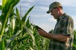 © Attasit - Farmers use tablets to analyze data and experiment with growing corn