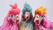 Three colorful brightly colored chickens are looking at the camera. The concept of fantasy, surrealism.
