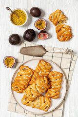 Poster - passion fruit puff pastry turnovers on a plate