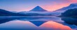 Mirrored Reflection of Mountain in Serene Lake at Mesmerizing Sunrise