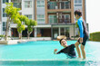 © DG PhotoStock - Little boy and father enjoy swimming.