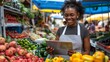 an african american woman in farmers market working in her  tablet