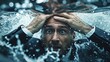 Man overwhelmed underwater with expressive face