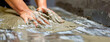 Careful hands sculpt therapeutic mud on a client's back, spa wellness concept. Spa Maasage treatments therapeutic gray mud scrub for scalp and body care. Relaxation, pacification. Banner. Copy space