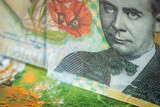 Fototapeta  - Romania money, Banknote of 200 Romanian Lei against the background of the world, Financial market concept