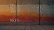 Sunset hues on a weathered concrete wall.