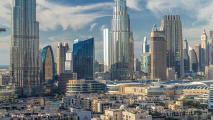 Wall Mural - Dubai Downtown skyline timelapse with Burj Khalifa and other towers panoramic view from the top in Dubai