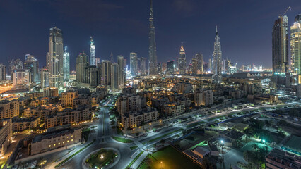 Poster - Dubai Downtown skyline night to day timelapse with Burj Khalifa and other towers panoramic view from the top in Dubai