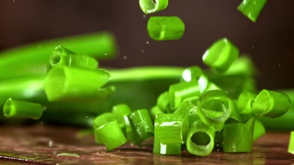 Sticker - Super slow motion green onions. High quality FullHD footage