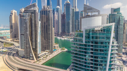Wall Mural - Aerial view of Dubai Marina residential and office skyscrapers with waterfront timelapse