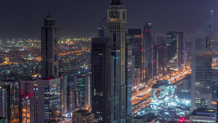 Sticker - Skyline of the buildings of Sheikh Zayed Road and DIFC aerial night to day timelapse in Dubai, UAE.