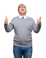 Middle age bussines arab man wearing glasses over isolated background success sign doing positive gesture with hand, thumbs up smiling and happy