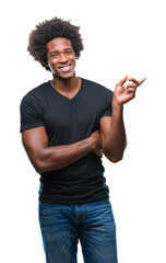 Poster - Afro american man over isolated background with a big smile on face, pointing with hand and finger to the side looking at the camera.