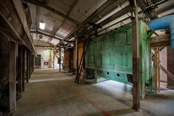 Wall Mural - Over 150-Year-Old 19th century Abandoned Brick Grain Mill Powered by Electricity