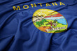 big waving national flag of montana state. macro shot