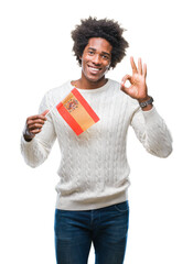 Poster - Afro american man flag of Spain over isolated background doing ok sign with fingers, excellent symbol