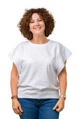 Sticker - Beautiful middle ager senior woman wearing white t-shirt over isolated background with a happy and cool smile on face. Lucky person.