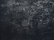 Black abstract background texture showcases uneven grunge surface