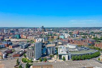 Canvas Print - Aerial photo of the Leeds city centre showing the area called The Leeds Dock, along side the canal showing the Royal Armouries Museum and canal with boats.