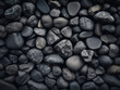 Stone texture in dark gray or black features natural patterns