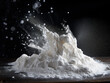 Toned image depicts flour spillage against a black metal backdrop