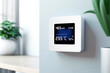 © Garnar - A high-tech thermostat with air quality index, showing CO2 levels, temperature, and humidity on a serene wall, embodying modern home automation and environmental consciousness