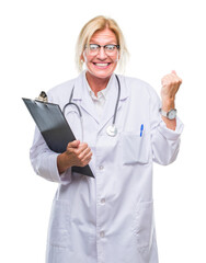 Wall Mural - Middle age blonde doctor woman holding clipboard over isolated background screaming proud and celebrating victory and success very excited, cheering emotion