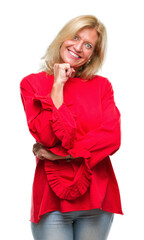 Sticker - Middle age blonde woman over isolated background looking confident at the camera with smile with crossed arms and hand raised on chin. Thinking positive.